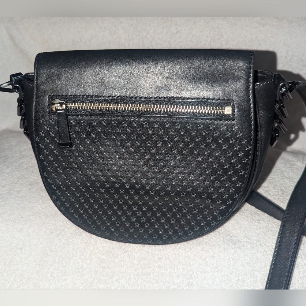 Rebecca Minkoff Star perforated leather Astor saddle bag.